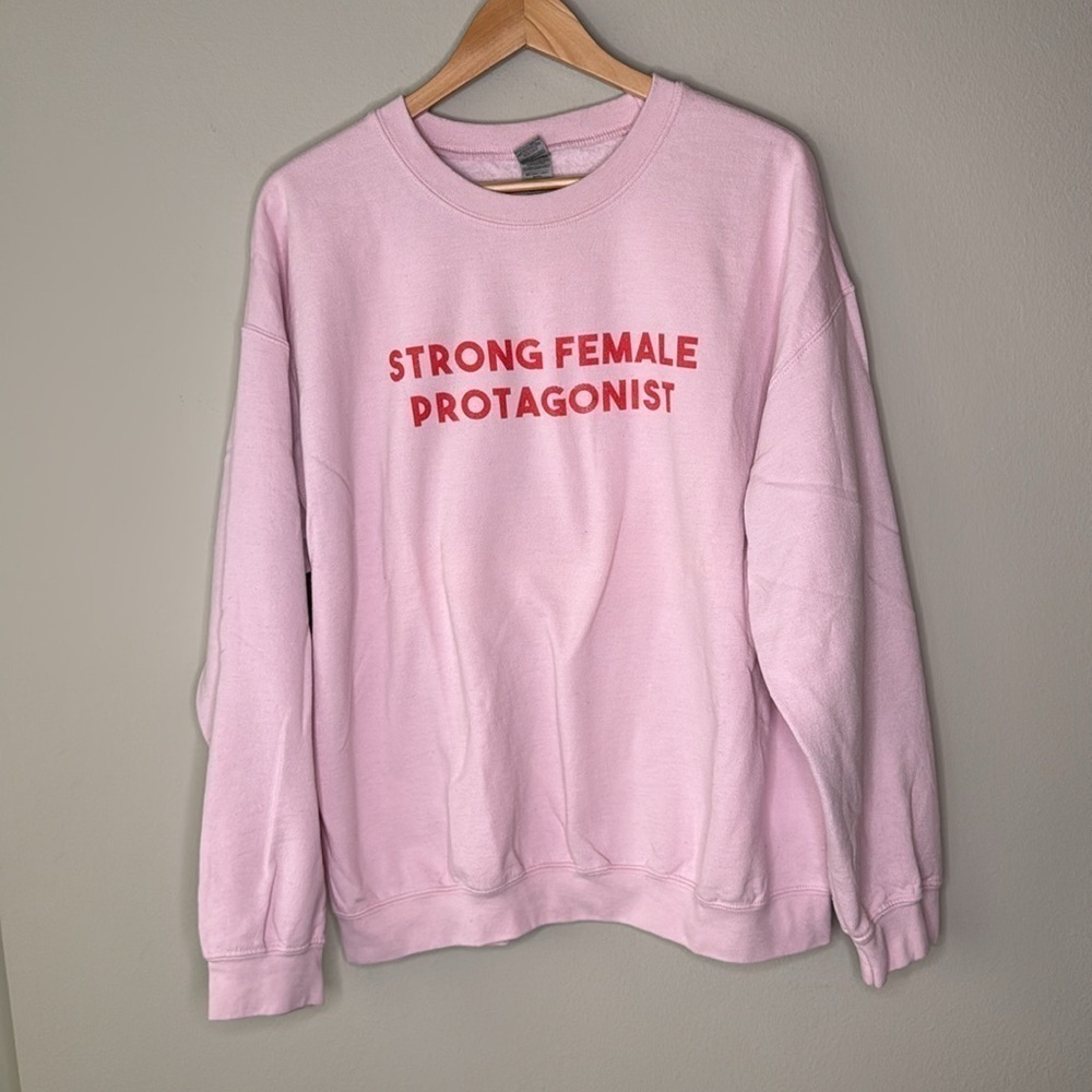 Gildan Strong Female Protagonist Crewneck Pullover Sweatshirt in Pink Size XL